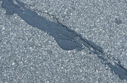 Patched Cracked Asphalt Road | Pro Polyjacking