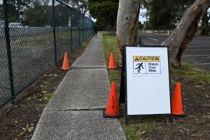 image of an uneven sidewalk - the cost of neglecting concrete leveling