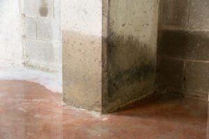 Concrete column that needs polyjacking for water damage.