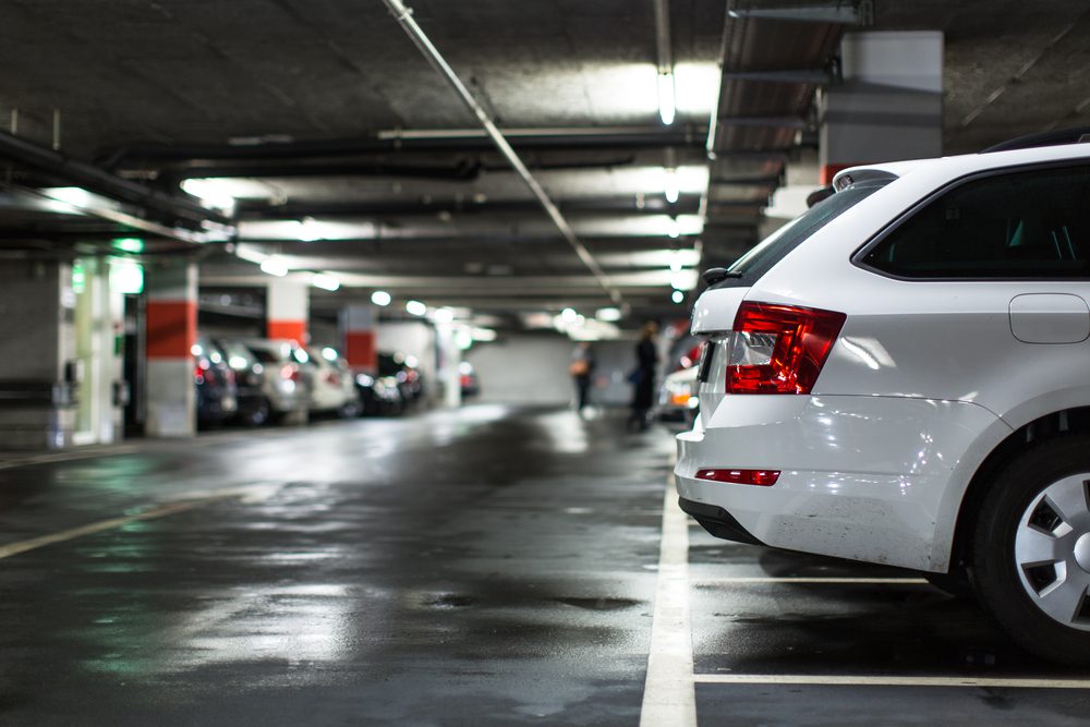 image of an underground parking garage. Learn why polyjacking parking structures is essential for business owners.