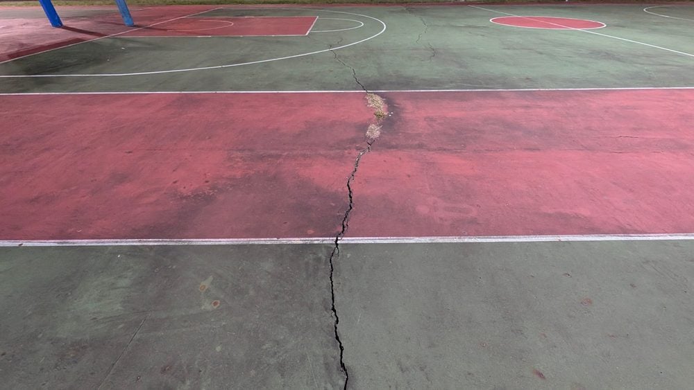 Polyjacking - image of a cracked basketball court