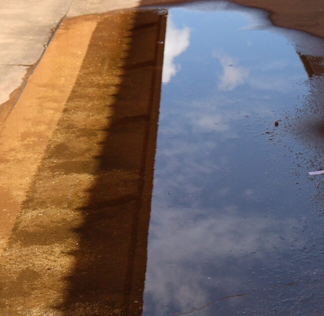 Image of water pooling on concrete