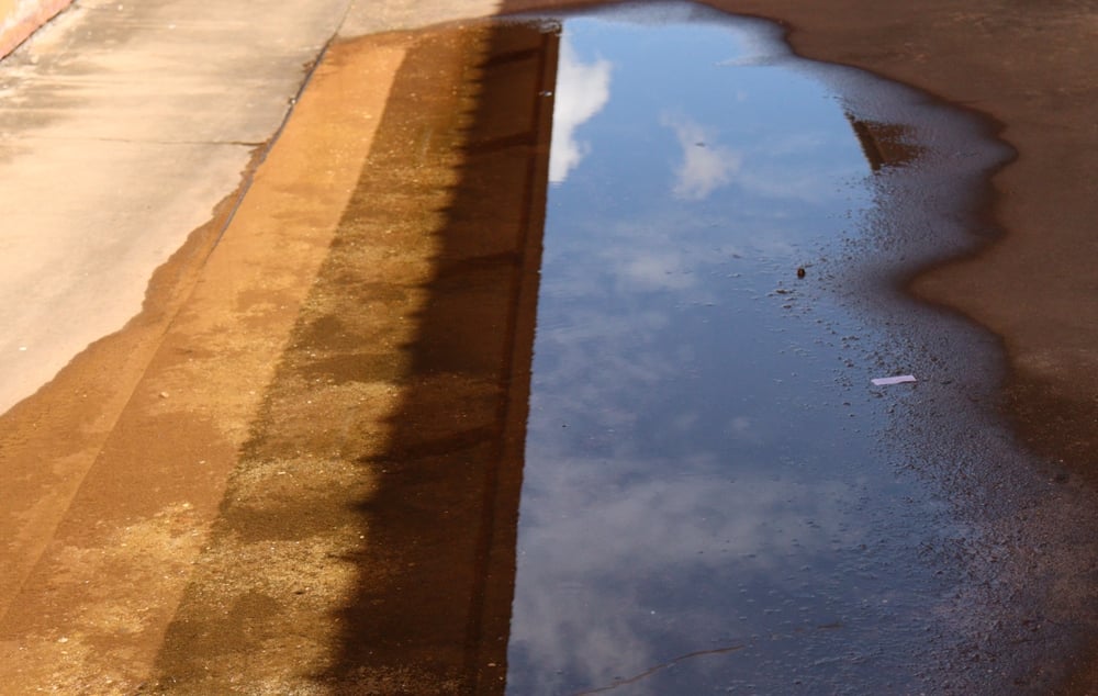 Image of water pooling on concrete